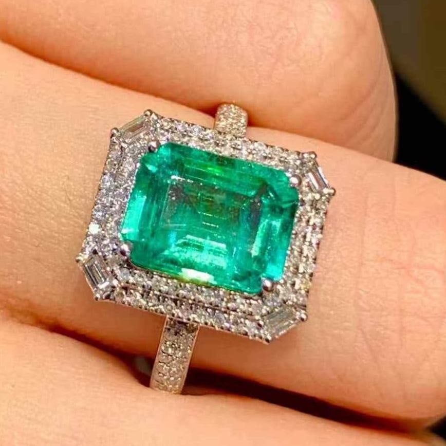 14k Gold 2.4 Ct Natural Emerald & Diamond Ring: Ref:231109154 // gold content:14k gold // ring size:7. 25us // // main gemstone:emerald // shape:octagonal // carat weight:2. 4ct // color:green // treatment:natural // // adjacent gemstone 2 :