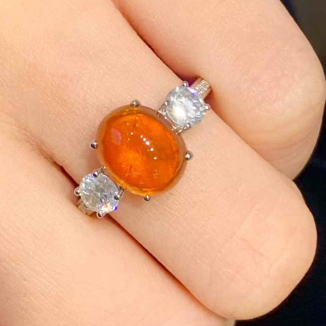 14k Gold 5.25 Ctw Natural Spessartine & Diamond Ring: Ref:231109171 // gold content:14k gold // ring size:7. 25us // // main gemstone:spessartine // shape:oval // carat weight:4. 55ct // color:orange // treatment:natural // // adjacent gemstone 2 :
