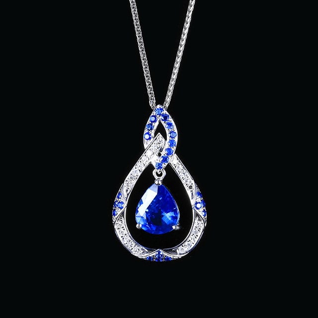 14k Gold 1.73 Ctw Natural Sapphire & Sapphire Pendant( Without Chain ): Ref:231109184 // gold content:14k gold // main gemstone:sapphire // shape:pear // carat weight:1. 5ct // color:blue // treatment:natural // // adjacent gemstone 2 : sapphire // shape:round // carat