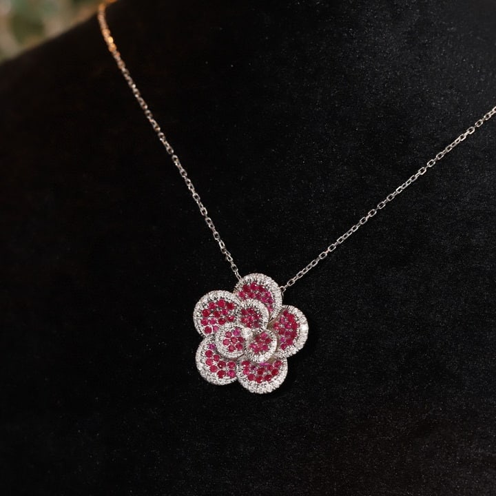 14k Gold 0.80 Ctw Natural Ruby & Diamond Necklace: Ref:231109200 // gold content:14k gold // main gemstone:ruby // shape:round // carat weight:0. 55ct // color:red // treatment:natural // cut grade:g // // adjacent gemstone 2 : diamond // shape:round 