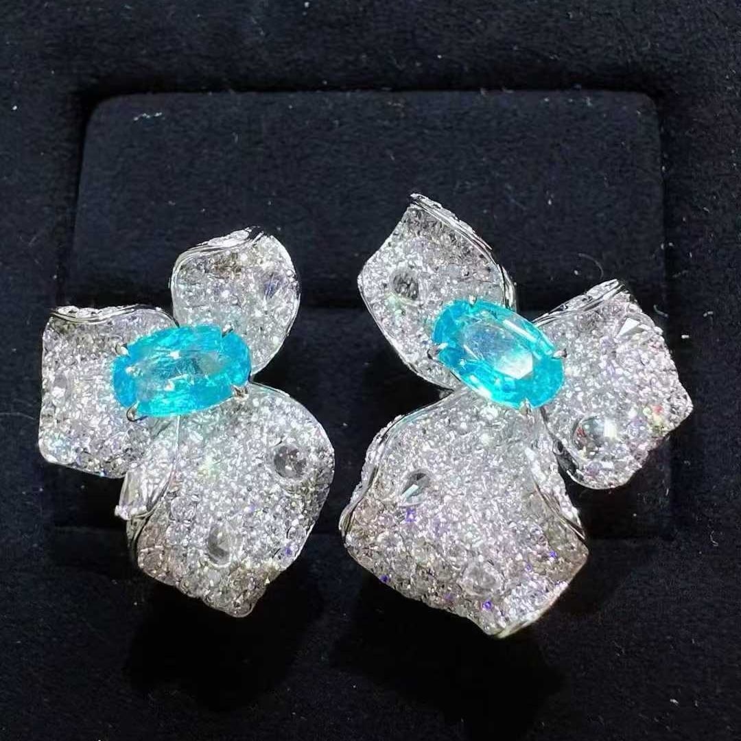 14k Gold 3.40 Ctw Natural Paraiba Tourmaline & Diamond Earrings: Ref:231109211 // gold content:14k gold // main gemstone:paraiba tourmaline // shape:oval // carat weight:1. 25ct // color:blue // treatment:natural // // adjacent gemstone 2 : diamond // shape:round