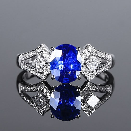 14k Gold 1.30 Ctw Natural Sapphire & Diamond Ring: Ref:231109228 // gold content:14k gold // ring size:7. 25us // // main gemstone:sapphire // shape:oval // carat weight:1. 01ct // color:blue // treatment:natural // // adjacent gemstone 2 : diamond //