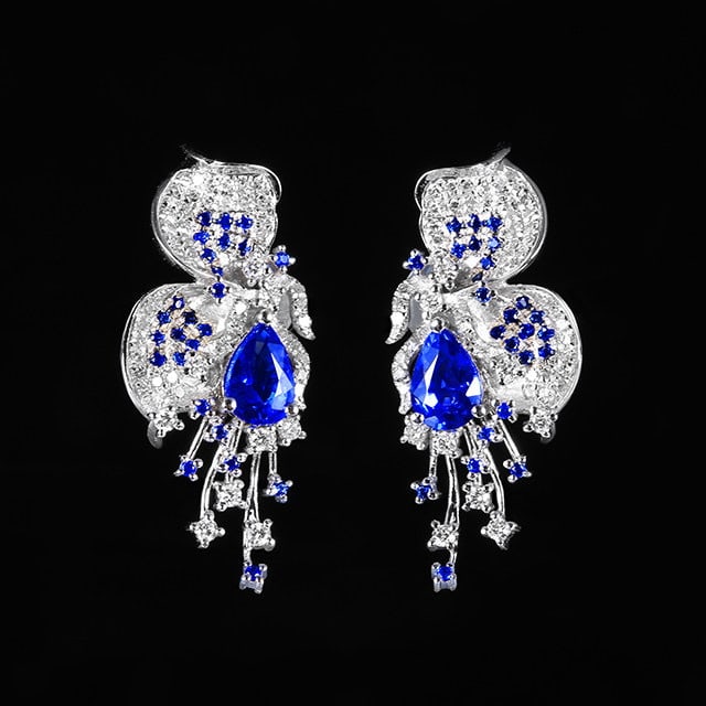14k Gold 1.37 Ctw Natural Sapphire & Sapphire Earrings: Ref:231109234 // gold content:14k gold // main gemstone:sapphire // shape:pear // carat weight:1. 12ct // color:blue // treatment:natural // // adjacent gemstone 2 : sapphire // shape:round // carat