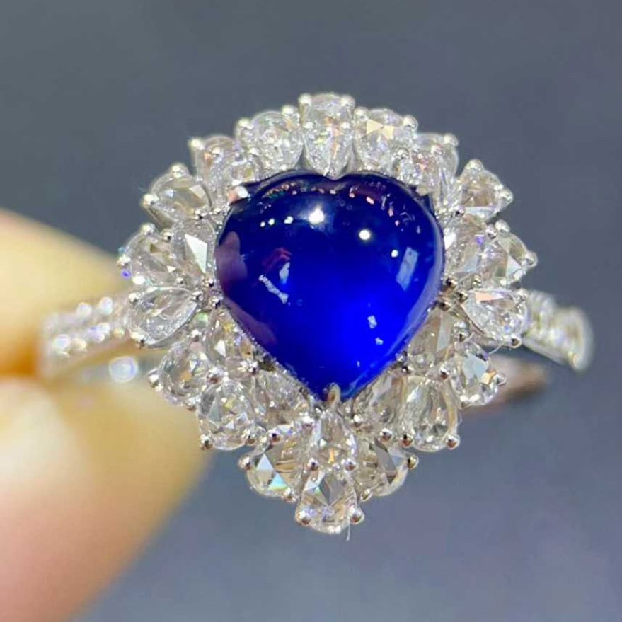 14k Gold 2.45 Ctw Vivid Blue Natural Sapphire & Diamond Ring: Ref:231110021 // gold content:14k gold // ring size:7. 25us // // main gemstone:sapphire // shape:heart // carat weight:1. 90ct // color:vivid blue // treatment:natural // // adjacent gemstone 2 :