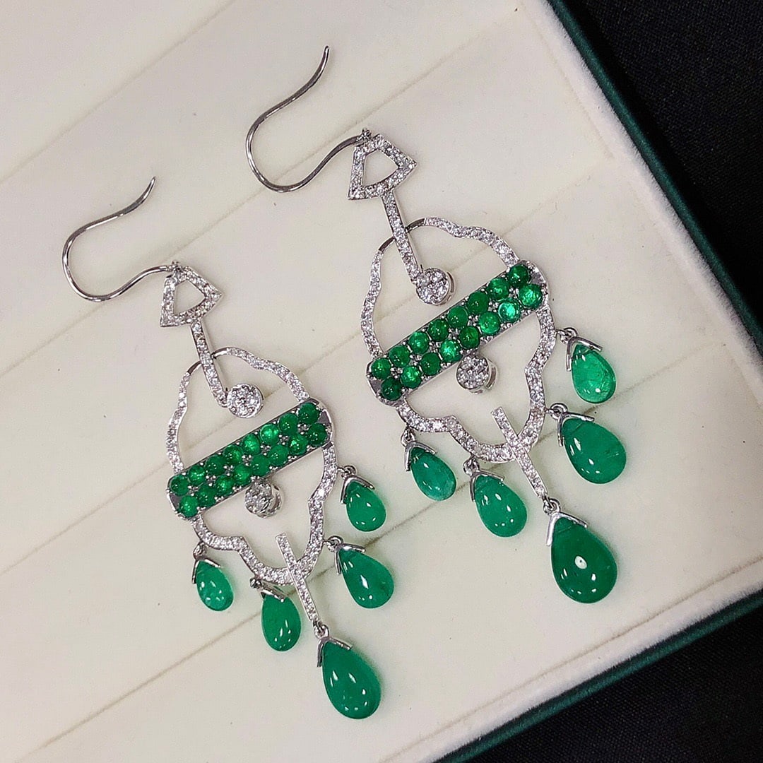 14k Gold 14.17 Ctw Natural Emerald & Diamond Earrings: Ref:231110025 // gold content:14k gold // main gemstone:emerald // shape:pear // carat weight:12. 97ct // color:green // treatment:natural // // adjacent gemstone 2 : diamond // shape:round // carat