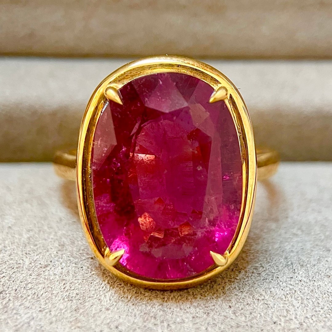 14k Gold 7.5 Ct Natural Tourmaline Ring: Ref:231110069 // gold content:14k gold // ring size:7. 25us // // main gemstone:tourmaline // shape:oval // carat weight:7. 5ct // color:red // treatment:natural // Low Estimate: 4600 Condition: New H