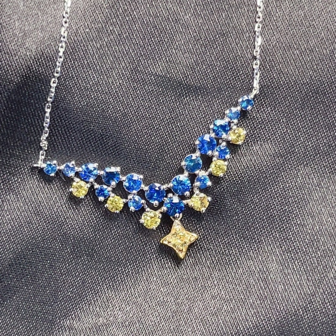 14k Gold 1.1 Ct Natural Sapphire Necklace: Ref:231110081 // gold content:14k gold // main gemstone:sapphire // shape:round // carat weight:1. 1ct // color:color // treatment:natural // cut grade:g // High Estimate: 5300 Low Estimate: 3500