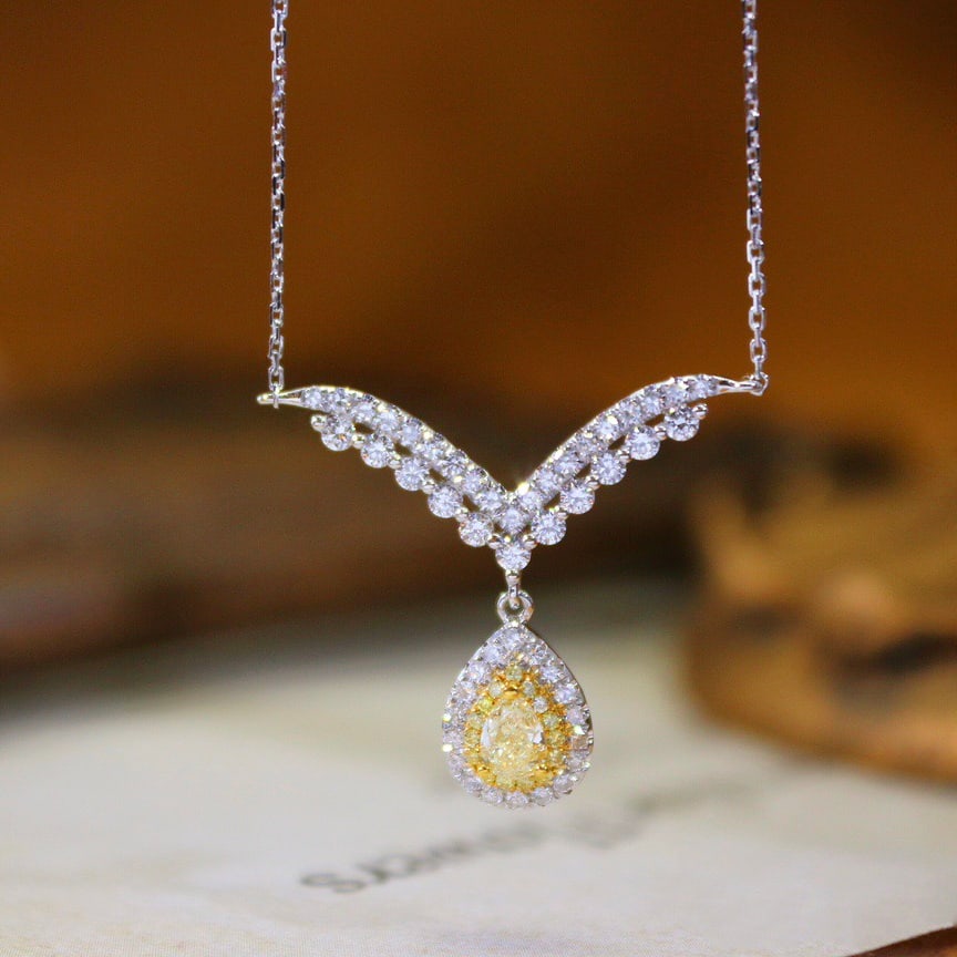 14k Gold 0.58 Ctw Natural Yellow Diamond & Diamond Necklace: Ref:231110099 // gold content:14k gold // main gemstone:yellow diamond // shape:pear // carat weight:0. 20ct // color:yellow // treatment:natural // // adjacent gemstone 2 : diamond // shape:round //