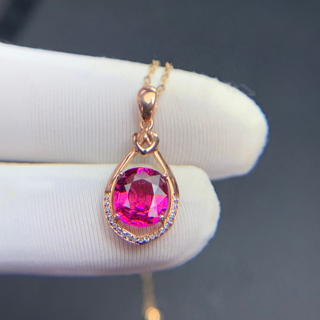 14k Gold 1.68 Ct Natural Tourmaline & Diamond Pendant( Without Chain ): Ref:231110122 // gold content:14k gold // main gemstone:tourmaline // shape:oval // carat weight:1. 68ct // color:red // treatment:natural // // adjacent gemstone 2 : diamond // shape:round //