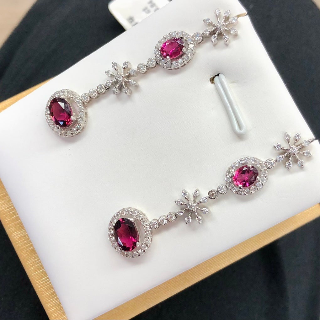 14k Gold 3.04 Ctw Natural Tourmaline & Diamond Earrings: Ref:231110180 // gold content:14k gold // main gemstone:tourmaline // shape:oval // carat weight:2. 2ct // color:red // treatment:natural // // adjacent gemstone 2 : diamond // number of stones:12 // 