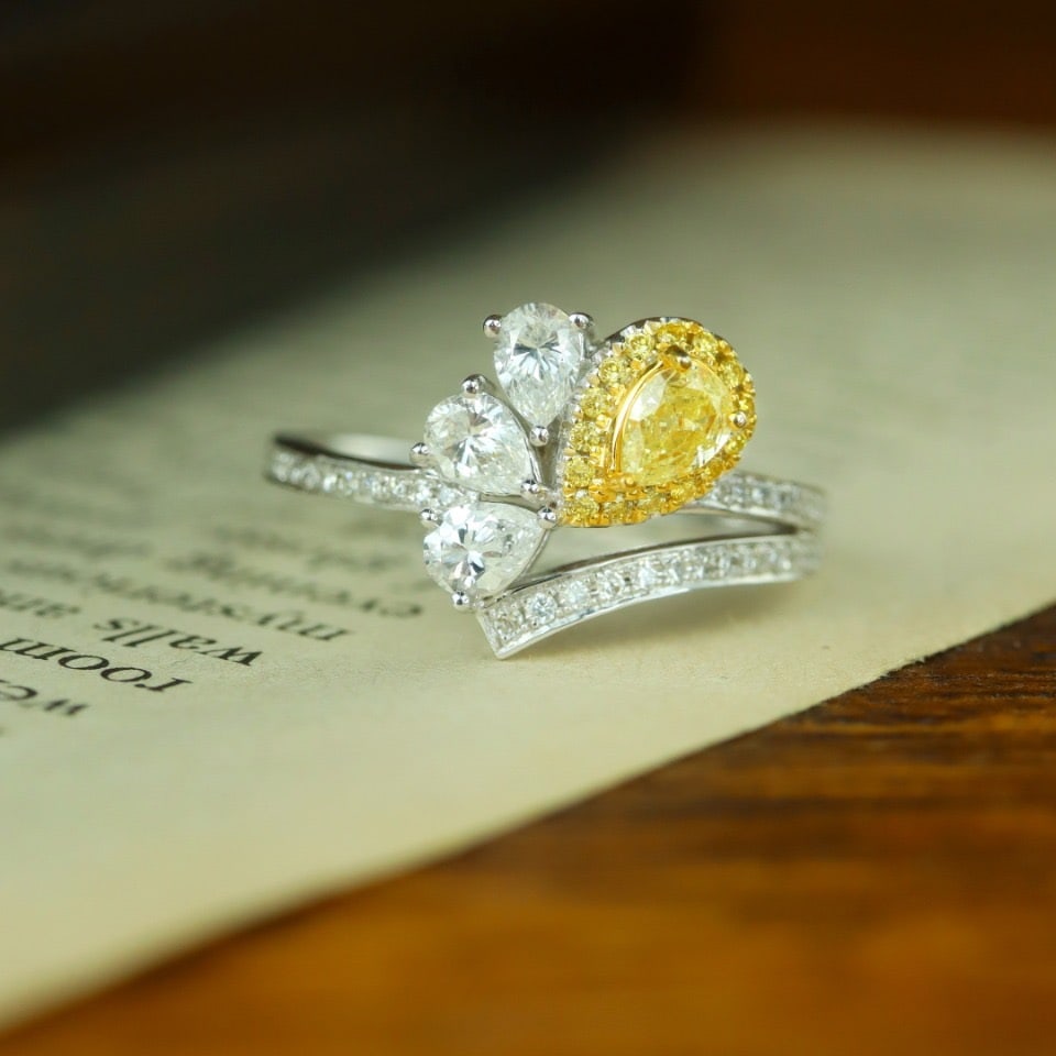 14k Gold 0.82 Ctw Natural Yellow Diamond & Diamond Ring: Ref:231110259 // gold content:14k gold // ring size:7. 25us // // main gemstone:yellow diamond // shape:pear // carat weight:0. 22ct // color:yellow // treatment:natural // // adjacent gemstone 2 :