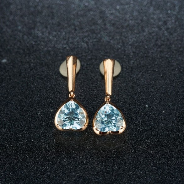 14k Gold 3.16 Ct Natural Aquamarine Earrings: Ref:231110263 // gold content:14k gold // main gemstone:aquamarine // shape:heart // carat weight:3. 16ct // color:blue // treatment:natural // High Estimate: 3100 Low Estimate: 2100 Condition: New