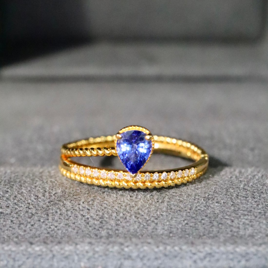 14k Gold 0.56 Ctw Natural Sapphire & Diamond Ring: Ref:231110276 // gold content:14k gold // ring size:7. 25us // // main gemstone:sapphire // shape:pear // carat weight:0. 50ct // color:blue // treatment:natural // // adjacent gemstone 2 : diamond