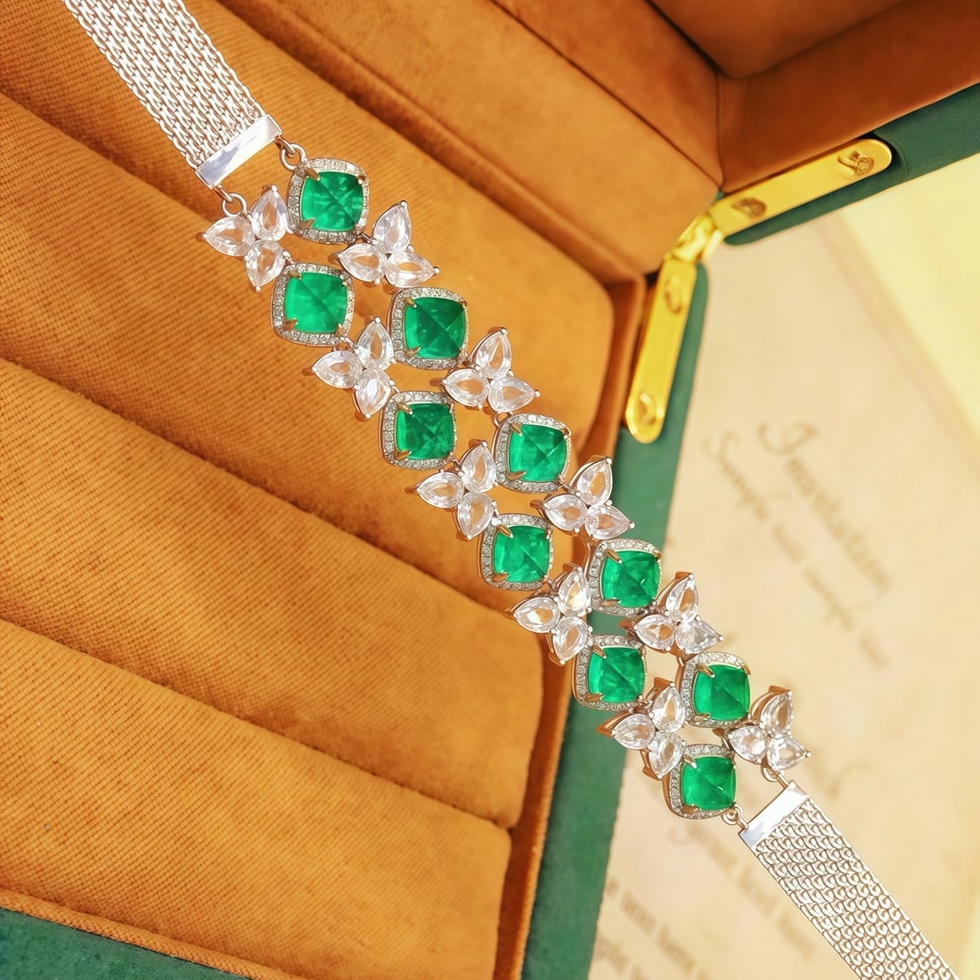 14k Gold 13.05 Ctw Vivid Green Natural Emerald & Sapphire Bracelet: Ref:231110289 // gold content:14k gold // main gemstone:emerald // shape:sugar-loaf // carat weight:7. 15ct // color:vivid green // treatment:natural // // adjacent gemstone 2 : sapphire // number of 