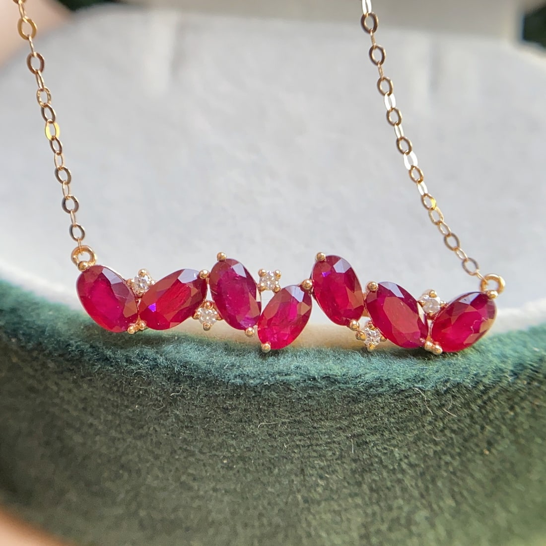 14k Gold 2.80 Ct Natural Ruby & Diamond Necklace: Ref:231110293 // gold content:14k gold // main gemstone:ruby // shape:oval // carat weight:2. 80ct // color:red // treatment:natural // // adjacent gemstone 2 : diamond // number of stones:5 //