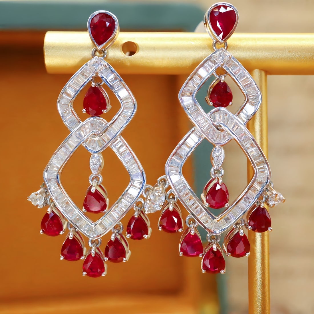 14k Gold 4.62 Ctw Natural Ruby & Diamond Earrings: Ref:231110315 // gold content:14k gold // main gemstone:ruby // shape:pear // carat weight:3. 65ct // color:pigeonblood red // treatment:natural // // adjacent gemstone 2 : diamond // number of