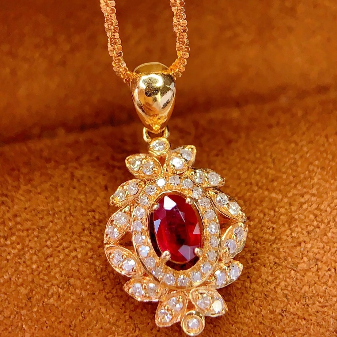14k Gold 0.4 Ct Natural Ruby & Diamond Pendant( Without Chain ): Ref:231110329 // gold content:14k gold // main gemstone:ruby // shape:oval // carat weight:0. 4ct // color:red // treatment:natural // // adjacent gemstone 2 : diamond // number of stones:47 //