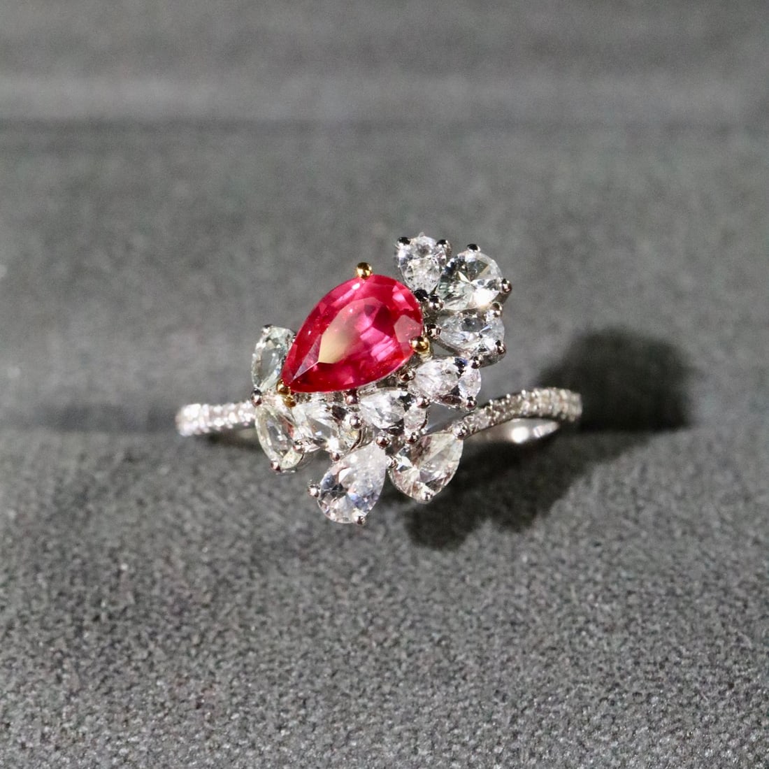 14k Gold 0.85 Ctw Natural Ruby & Diamond Ring: Ref:231110385 // gold content:14k gold // ring size:7. 25us // // main gemstone:ruby // shape:pear // carat weight:0. 77ct // color:red // treatment:natural // // adjacent gemstone 2 : diamond //
