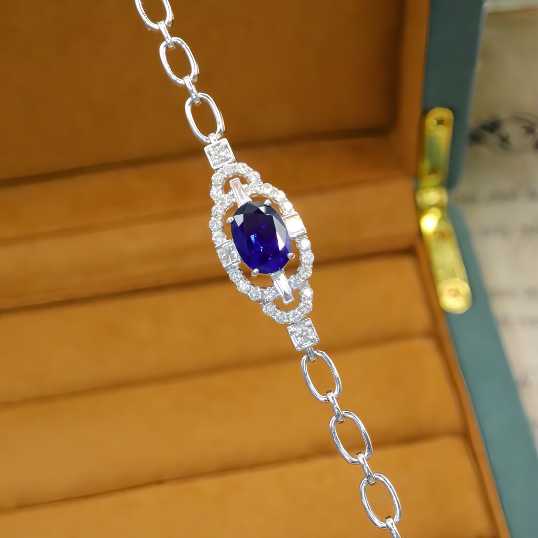 14k Gold 2.90 Ctw Natural Sapphire & Diamond Bracelet: Ref:231110399 // gold content:14k gold // main gemstone:sapphire // shape:oval // carat weight:2. 03ct // color:royal blue // treatment:natural // // adjacent gemstone 2 : diamond // number of