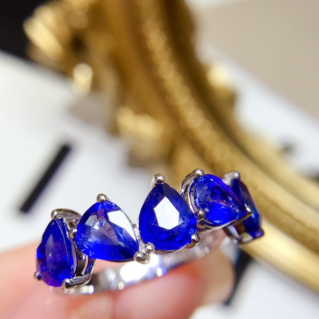 14k Gold 3.35 Ct Vivid Blue Natural Sapphire Ring: Ref:231110402 // gold content:14k gold // ring size:7. 25us // // main gemstone:sapphire // shape:pear // carat weight:3. 35ct // color:vivid blue // treatment:natural // Low Estimate: 3700