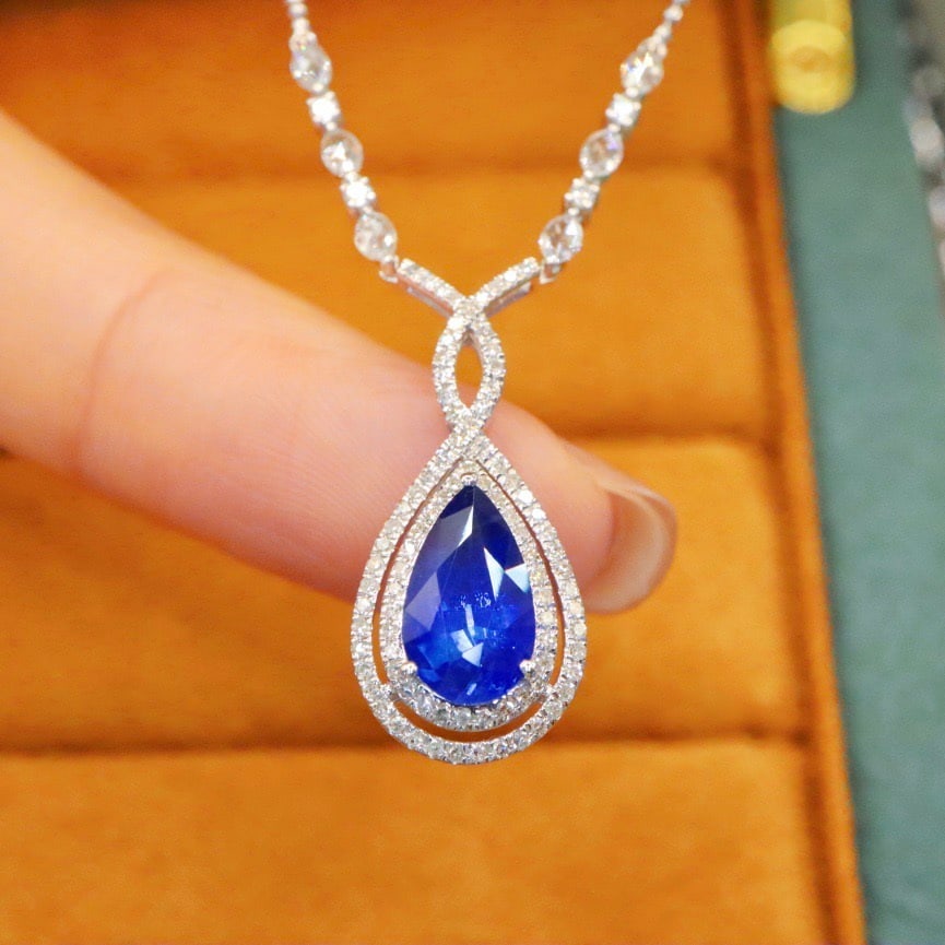 14k Gold 2.10 Ctw Natural Sapphire & Diamond Necklace: Ref:231110450 // gold content:14k gold // main gemstone:sapphire // shape:pear // carat weight:1. 63ct // color:royal blue // treatment:natural // // adjacent gemstone 2 : diamond // number of stones: