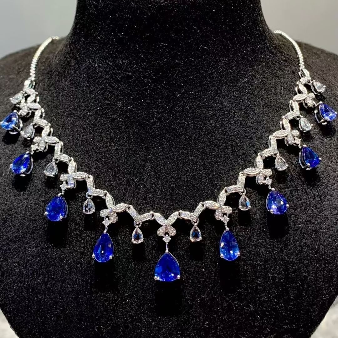 14k Gold 5.5 Ct Natural Sapphire & Diamond & Sapphire Necklace: Ref:231113025 // gold content:14k gold // main gemstone:sapphire // shape:pear // carat weight:5. 5ct // color:blue // treatment:natural // // adjacent gemstone 2 : diamond // shape:round // clarity