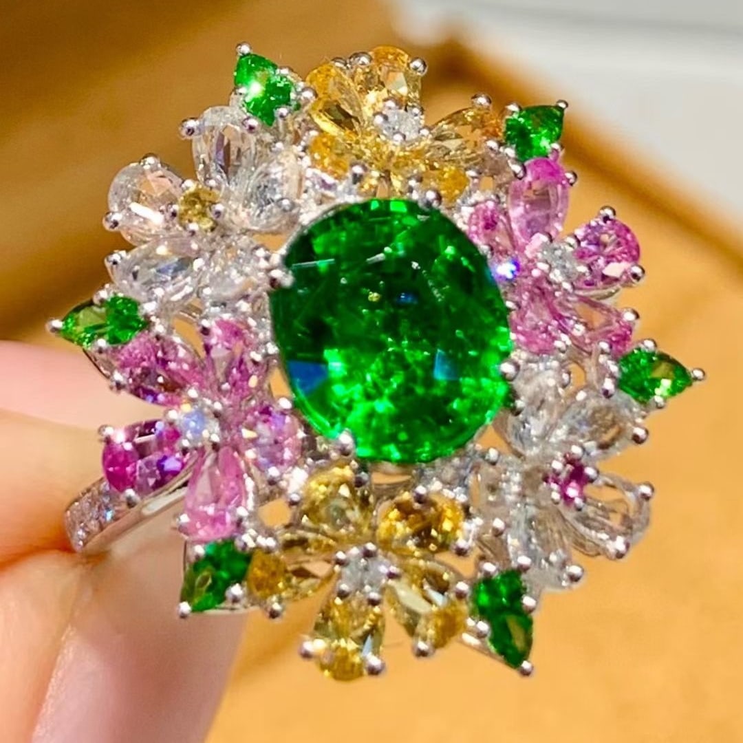 14k Gold 2.01 Ct Natural Tsavorite & Coloured Gemstone & Diamond Ring: Ref:231113050 // gold content:14k gold // ring size:7. 25us // // main gemstone:tsavorite // shape:oval // carat weight:2. 01ct // color:green // treatment:natural // // adjacent gemstone 2 :