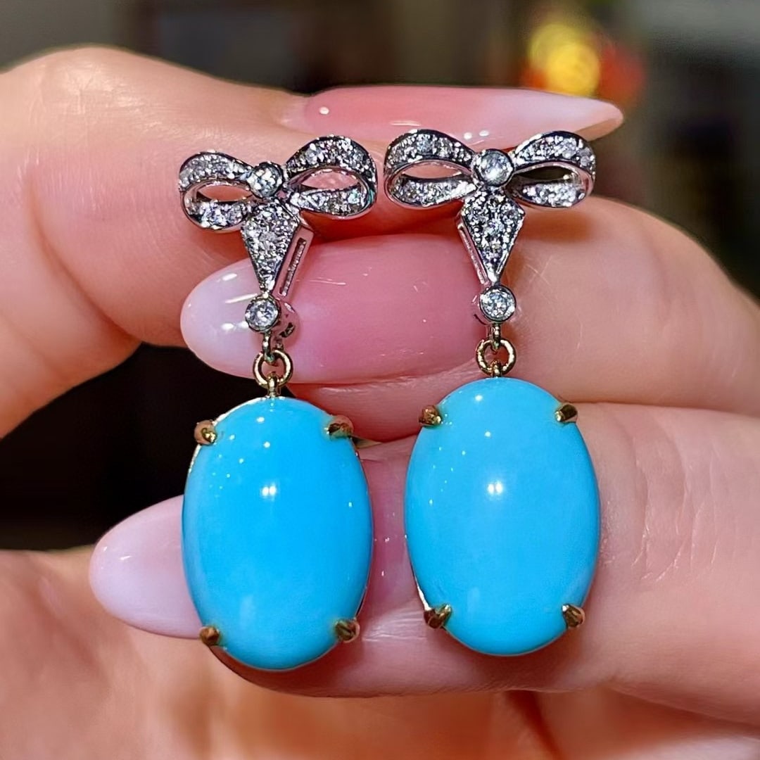14k Gold 8.30 Ctw Natural Blue Turquoise & Diamond Earrings: Ref:231113057 // gold content:14k gold // main gemstone:blue turquoise // shape:oval // carat weight:8. 09ct // color:blue // treatment:natural // // adjacent gemstone 2 : diamond // shape:round //