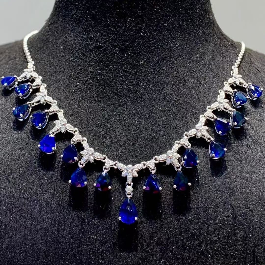 14k Gold 7.1 Ct Natural Sapphire & Diamond Necklace: Ref:231113065 // gold content:14k gold // main gemstone:sapphire // shape:pear // carat weight:7. 1ct // color:blue // treatment:natural // // adjacent gemstone 2 : diamond // shape:round // clarity
