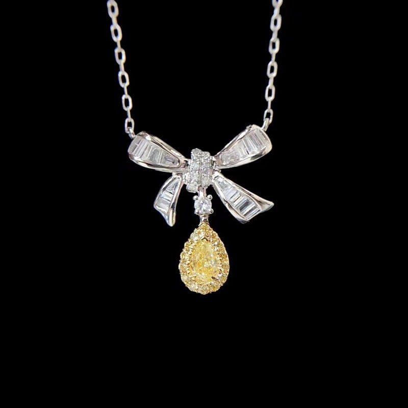 14k Gold 0.40 Ctw Natural Yellow Diamond & Diamond Necklace: Ref:231113077 // gold content:14k gold // main gemstone:yellow diamond // shape:pear // carat weight:0. 17ct // color:yellow // treatment:natural // // adjacent gemstone 2 : diamond // shape:multiple