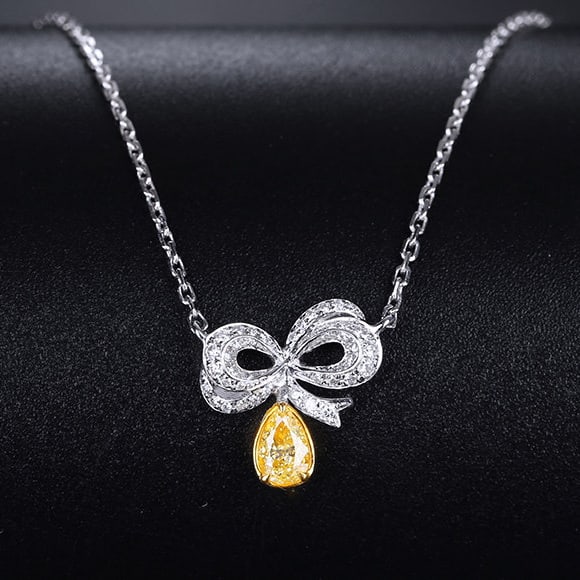 14k Gold 0.21 Ctw Natural Yellow Diamond & Diamond Necklace: Ref:231113122 // gold content:14k gold // main gemstone:yellow diamond // shape:pear // carat weight:0. 13ct // color:yellow // treatment:natural // // adjacent gemstone 2 : diamond // shape:round //