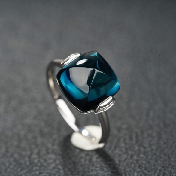14k Gold 9.95 Ct Natural Topaz & Diamond Ring: Ref:231113129 // gold content:14k gold // ring size:7. 25us // // main gemstone:topaz // shape:sugar-loaf // carat weight:9. 95ct // color:blue // treatment:natural // // adjacent gemstone 2 :