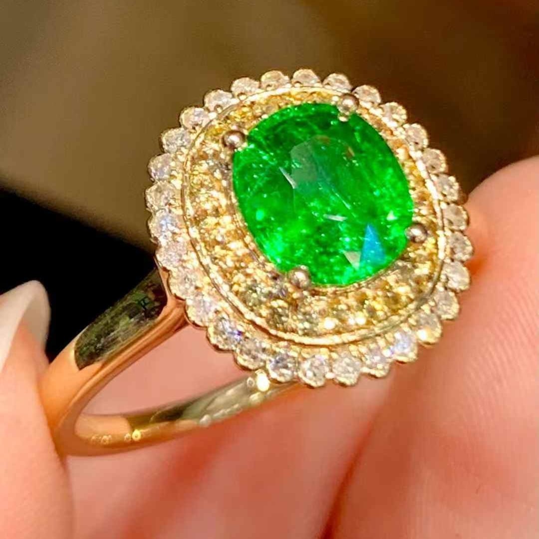 14k Gold 1.65 Ct Natural Tsavorite & Diamond Ring: Ref:231113138 // gold content:14k gold // ring size:7. 25us // // main gemstone:tsavorite // shape:oval // carat weight:1. 65ct // color:green // treatment:natural // // adjacent gemstone 2 : diamond