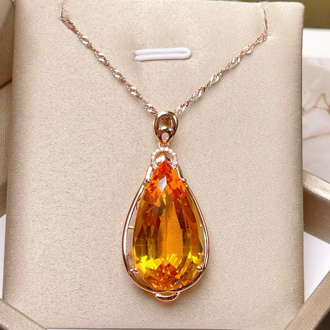 14k Gold 19.93 Ctw Natural Citrine & Diamond Pendant( Without Chain ): Ref:231113234 // gold content:14k gold // main gemstone:citrine // shape:pear // carat weight:19. 9ct // color:yellow // treatment:natural // // adjacent gemstone 2 : diamond // number of stones:12
