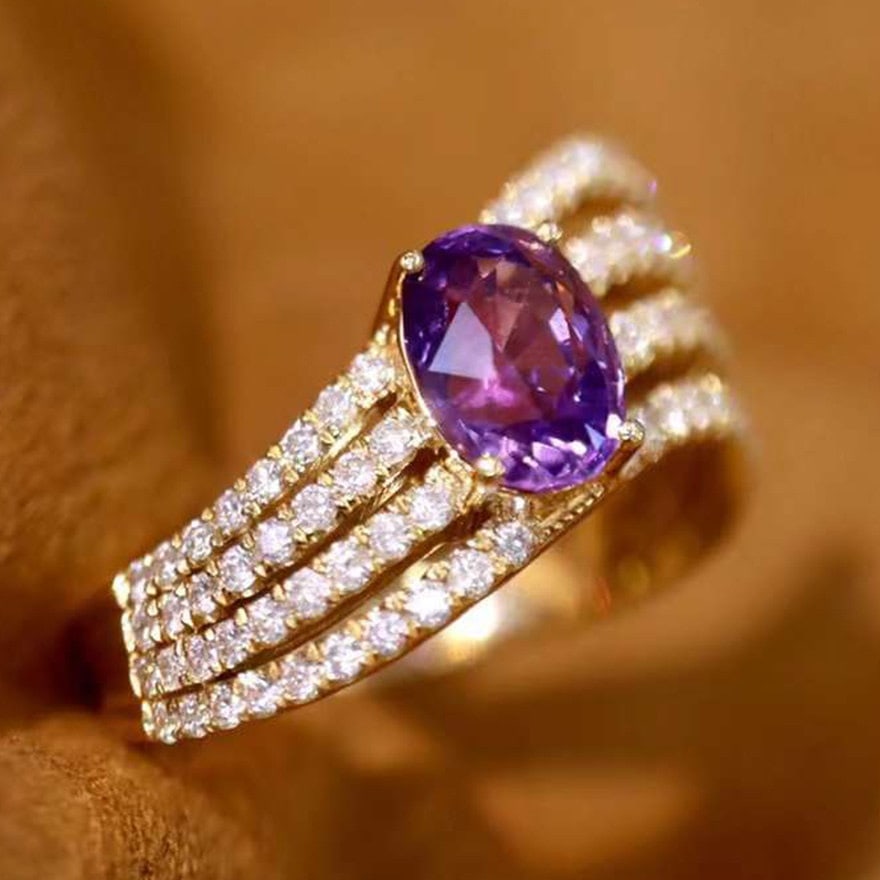 14k Gold 2.29 Ctw Natural Sapphire & Diamond Ring: Ref:231114012 // gold content:14k gold // ring size:7. 25us // // main gemstone:sapphire // shape:oval // carat weight:1. 73ct // color:purple // treatment:natural // // adjacent gemstone 2 : diamond