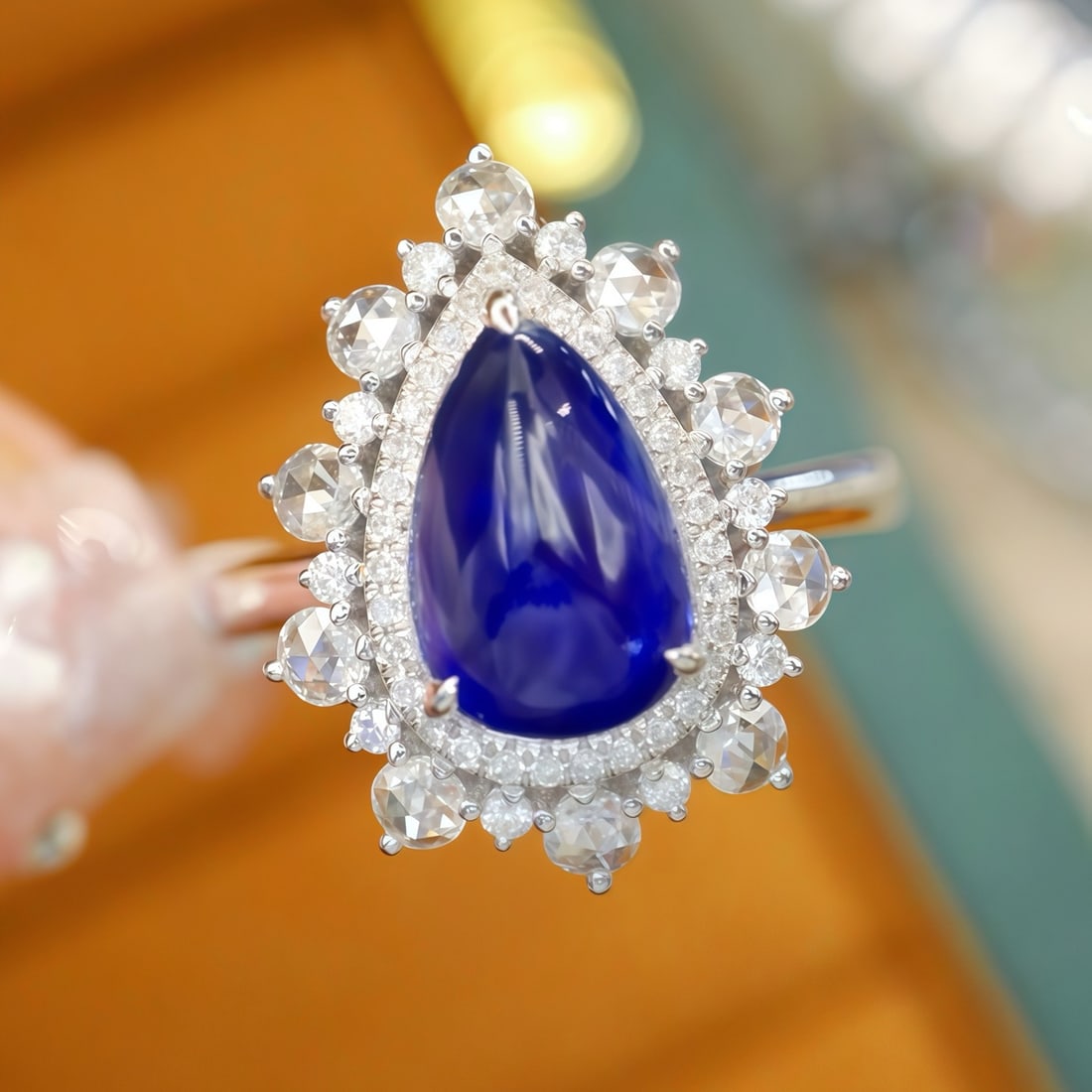 14k Gold 2.46 Ctw Natural Sapphire & Diamond Ring: Ref:231114066 // gold content:14k gold // ring size:7. 25us // // main gemstone:sapphire // shape:pear // carat weight:2. 01ct // color:royal blue // treatment:natural // // adjacent gemstone 2 :