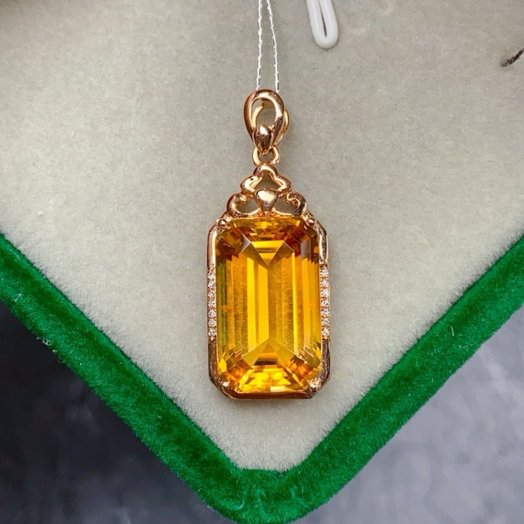 14k Gold 9.69 Ctw Natural Citrine & Diamond Pendant( Without Chain ): Ref:231114103 // gold content:14k gold // main gemstone:citrine // shape:octagonal // carat weight:9. 65ct // color:yellow // treatment:natural // // adjacent gemstone 2 : diamond // number of