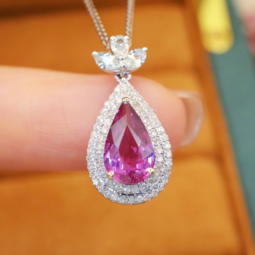 14k Gold 1.71 Ctw Natural Sapphire & Diamond Pendant( Without Chain ): Ref:231114138 // gold content:14k gold // main gemstone:sapphire // shape:pear // carat weight:1. 51ct // color:pink // treatment:natural // // adjacent gemstone 2 : diamond // number of stones:66 //