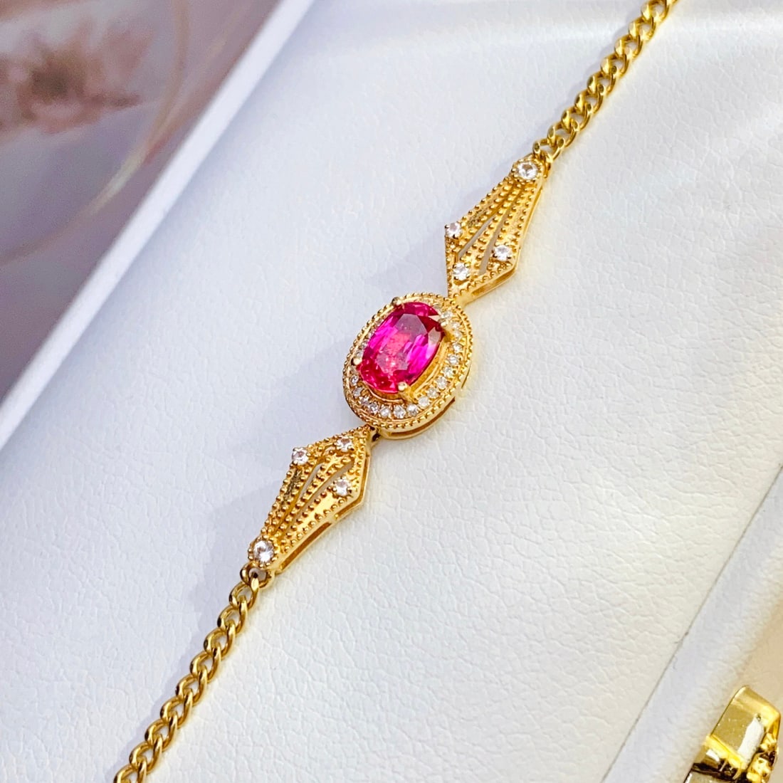 14k Gold 0.70 Ct Natural Ruby & Diamond & Sapphire Bracelet: Ref:231114140 // gold content:14k gold // main gemstone:ruby // shape:oval // carat weight:0. 70ct // color:red // treatment:natural // // adjacent gemstone 2 : diamond // number of stones:26 //