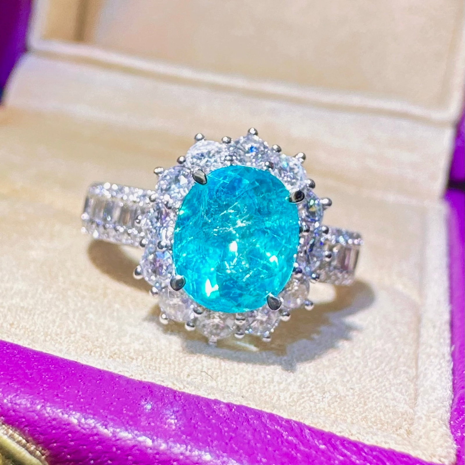 14k Gold 3.03 Ctw Natural Paraiba Tourmaline & Diamond Ring: Ref:231114151 // gold content:14k gold // ring size:7. 25us // // main gemstone:paraiba tourmaline // shape:oval // carat weight:2. 07ct // color:blue // treatment:natural // // adjacent gemstone 2 :