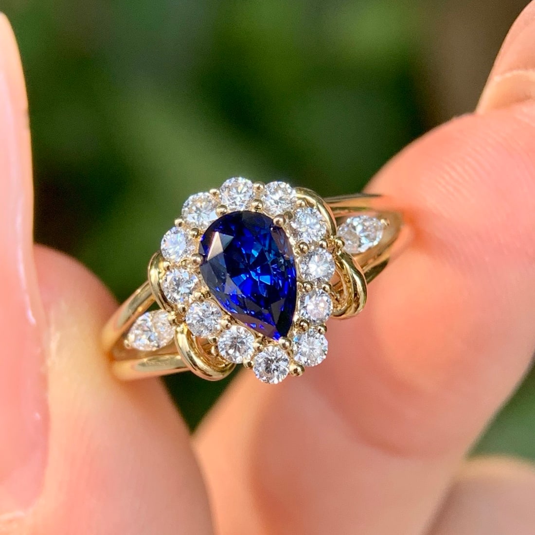 14k Gold 1.76 Ctw Natural Sapphire & Diamond Ring: Ref:231114155 // gold content:14k gold // ring size:7. 25us // // main gemstone:sapphire // shape:pear // carat weight:1. 26ct // color:royal blue // treatment:natural // // adjacent gemstone 2 :