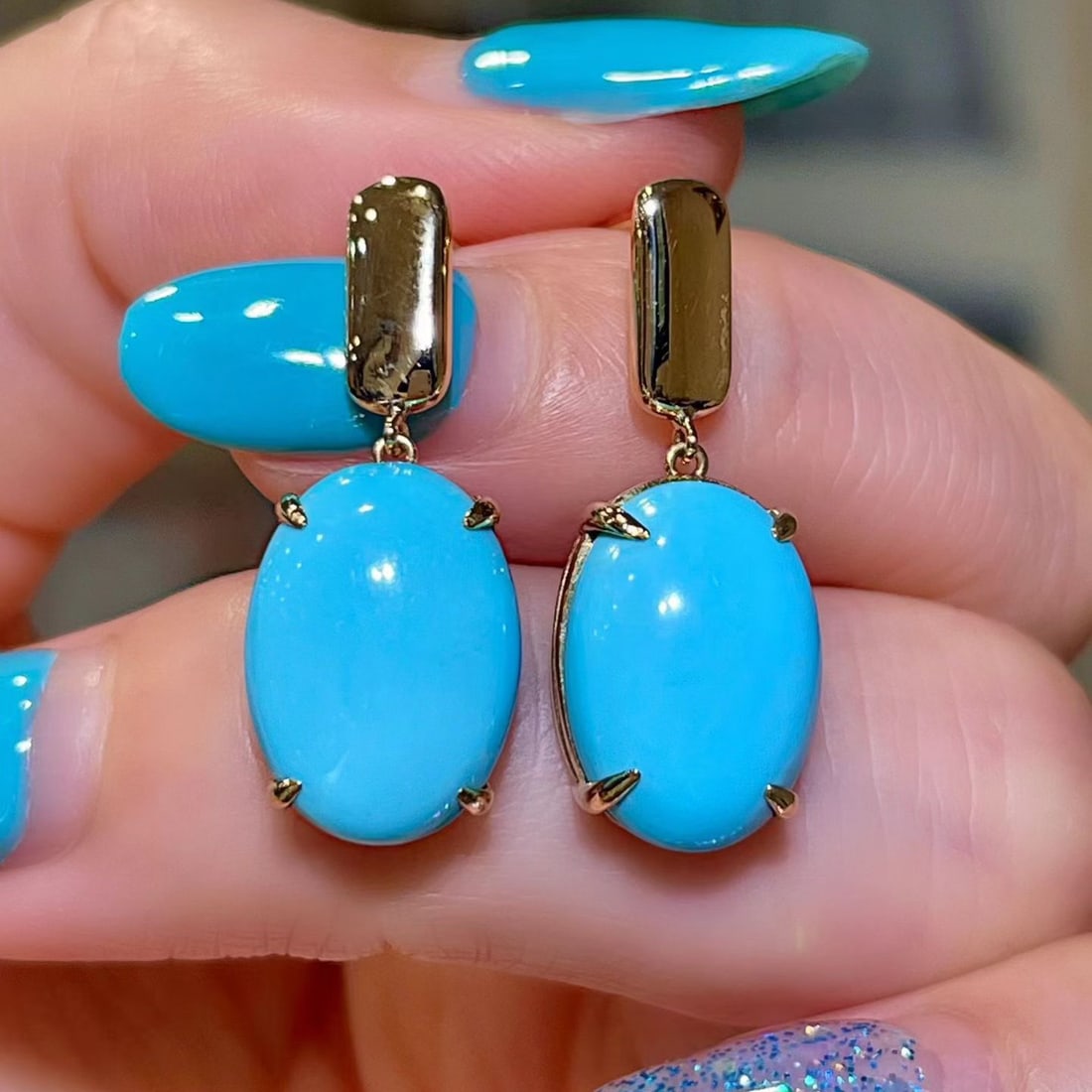 14k Gold 8.31 Ct Natural Blue Turquoise Earrings: Ref:231114174 // gold content:14k gold // main gemstone:blue turquoise // shape:oval // carat weight:8. 31ct // color:blue // treatment:natural // Condition: New Low Estimate: 4000.00 High Estimate:
