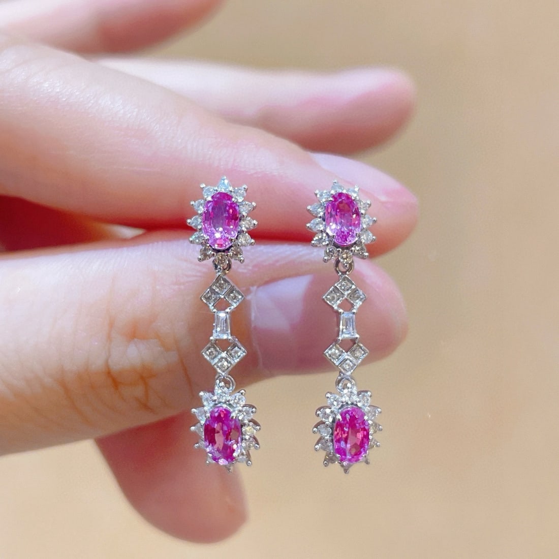 14k Gold 1.84 Ctw Natural Sapphire & Diamond Earrings: Ref:231114180 // gold content:14k gold // main gemstone:sapphire // shape:oval // carat weight:1. 37ct // color:pink // treatment:natural // // adjacent gemstone 2 : diamond // shape:multiple //