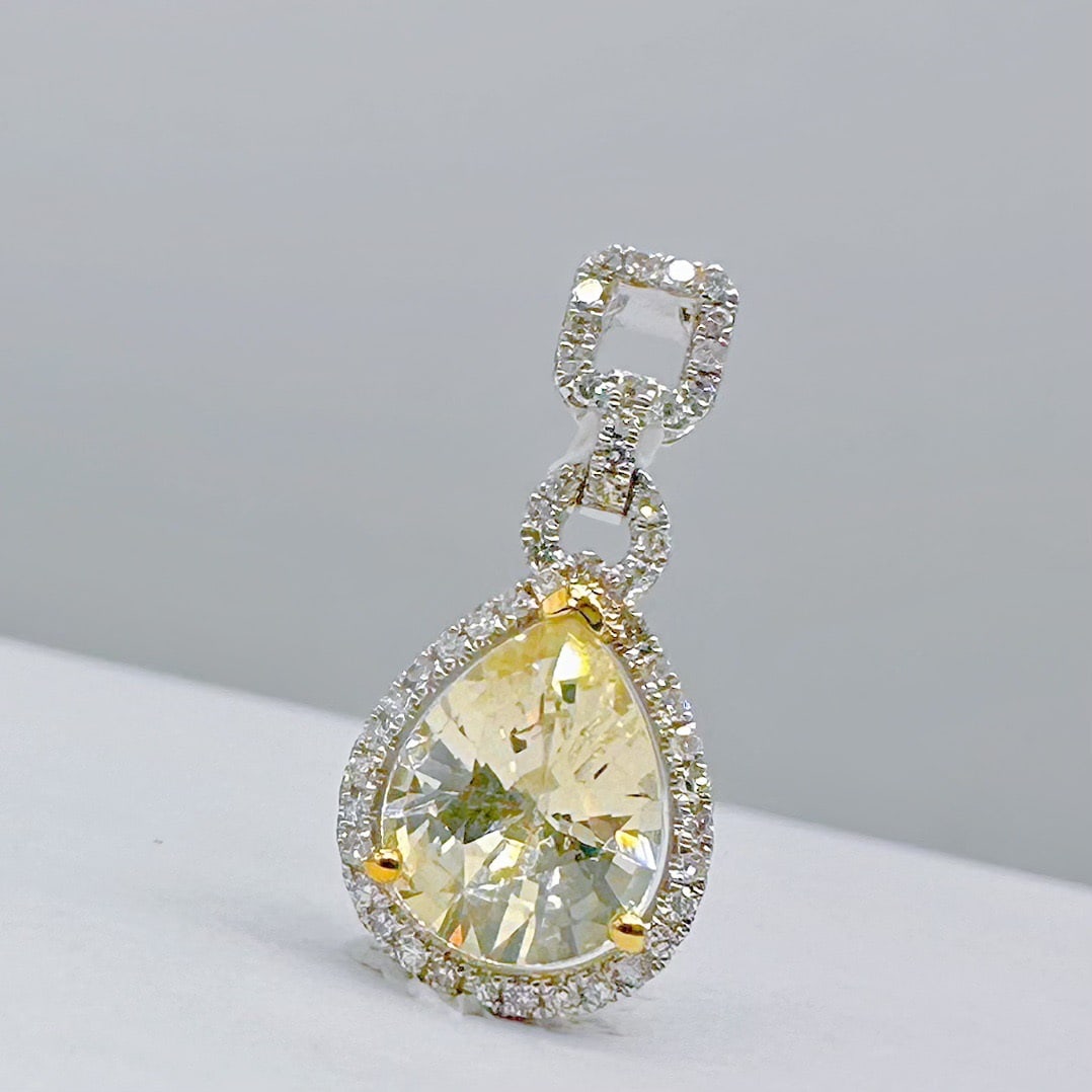 14k Gold 1.43 Ctw Natural Sapphire & Diamond Pendant( Without Chain ): Ref:231114270 // gold content:14k gold // main gemstone:sapphire // shape:pear // carat weight:1. 28ct // color:yellow // treatment:natural // // adjacent gemstone 2 : diamond // shape:round // carat
