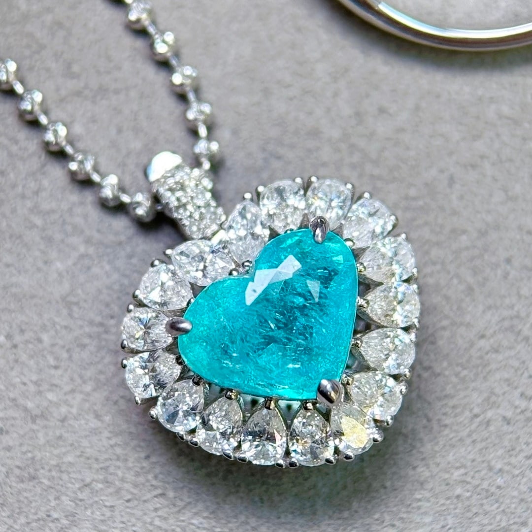 14k Gold 3.05 Ctw Natural Paraiba Tourmaline & Diamond Ring/pendant( Without Chain ): Ref:231114304 // gold content:14k gold // ring size:7. 25us // // main gemstone:paraiba tourmaline // shape:heart // carat weight:1. 96ct // color:blue // treatment:natural // // adjacent gemstone 2 :