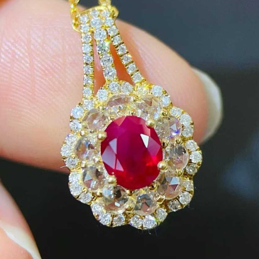 14k Gold 1.56 Ctw Natural Ruby & Diamond Pendant( Without Chain ): Ref:231114314 // gold content:14k gold // main gemstone:ruby // shape:oval // carat weight:1. 03ct // color:red // treatment:natural // // adjacent gemstone 2 : diamond // shape:round // carat