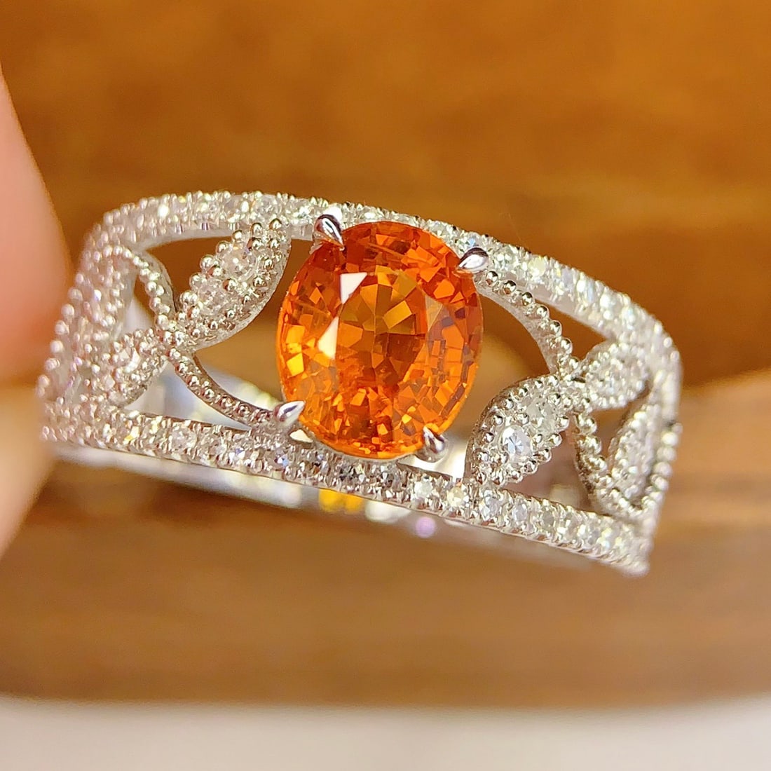 14k Gold 1.45 Ct Natural Sapphire & Diamond Ring: Ref:231114315 // gold content:14k gold // ring size:7. 25us // // main gemstone:sapphire // shape:oval // carat weight:1. 45ct // color:orange // treatment:natural // // adjacent gemstone 2 : diamond
