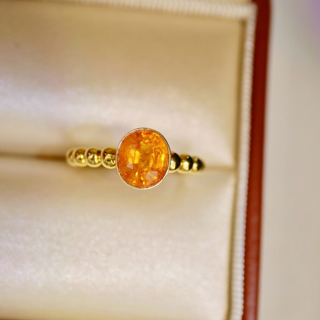 14k Gold 2.18 Ct Natural Spessartine Ring: Ref:231114331 // gold content:14k gold // ring size:7. 25us // // main gemstone:spessartine // shape:oval // carat weight:2. 18ct // color:orange // treatment:natural // Condition: New Low Estimate: