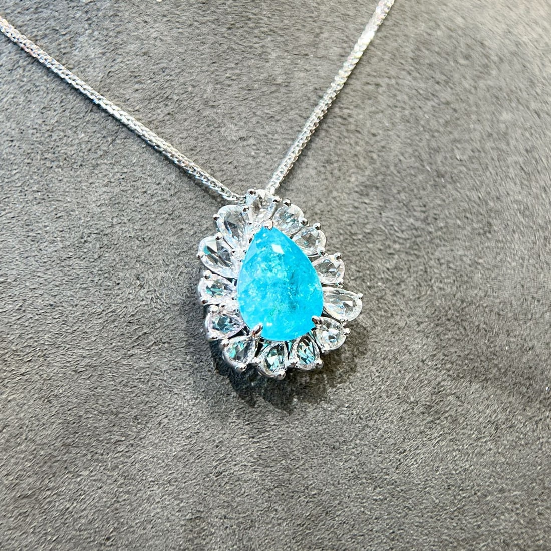 14k Gold 4.54 Ctw Natural Paraiba Tourmaline & Sapphire Pendant( Without Chain ): Ref:231114341 // gold content:14k gold // main gemstone:paraiba tourmaline // shape:pear // carat weight:3. 13ct // color:blue // treatment:natural // // adjacent gemstone 2 : sapphire // shape:pear