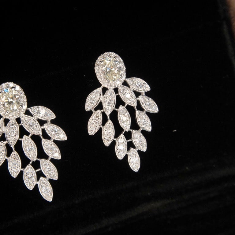 14k Gold 0.72 Ct Natural H Diamond Earrings: Ref:231114343 // gold content:14k gold // main gemstone:diamond // shape:multiple // carat weight:0. 72ct // clarity grade:vs-si // color:h // treatment:natural // Condition: New Low Estimate: